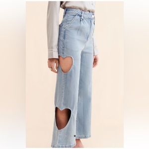 Native youth heart cutout jeans